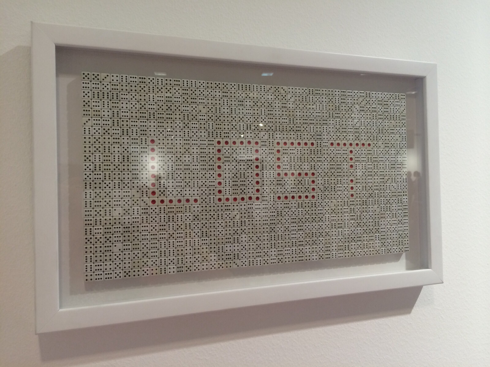framed dices, lost written by the red zero side of the dices