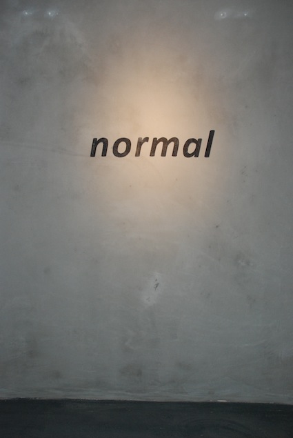 text on gray wall:normal